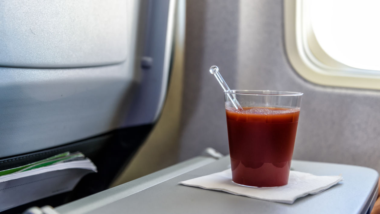 surviving a long flight with tomato juice